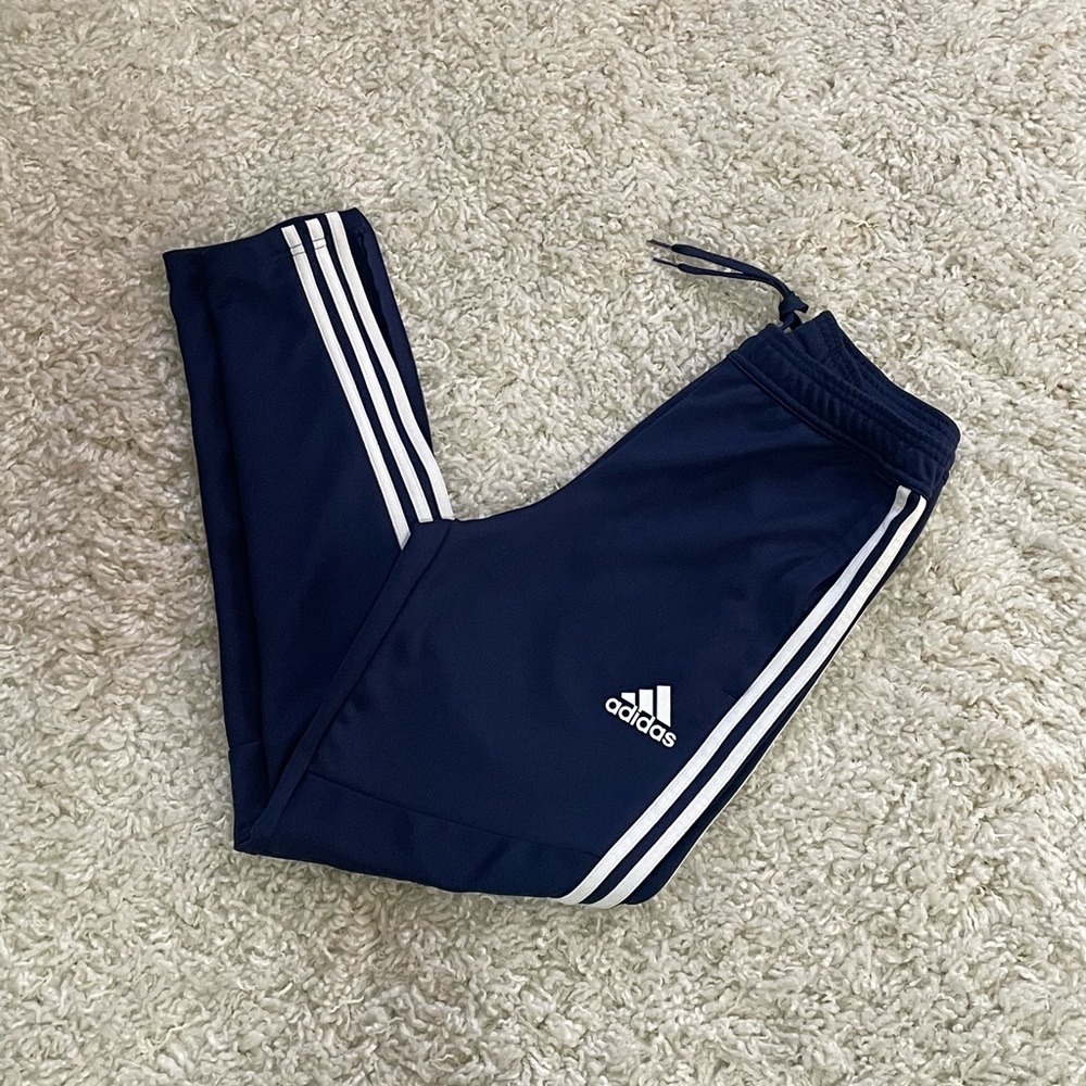 Adidas Tiro Pants in Navy with White Stripes in Men’s Small.